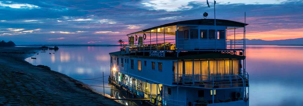 Sunset cruise on mighty river Brahmaputra
